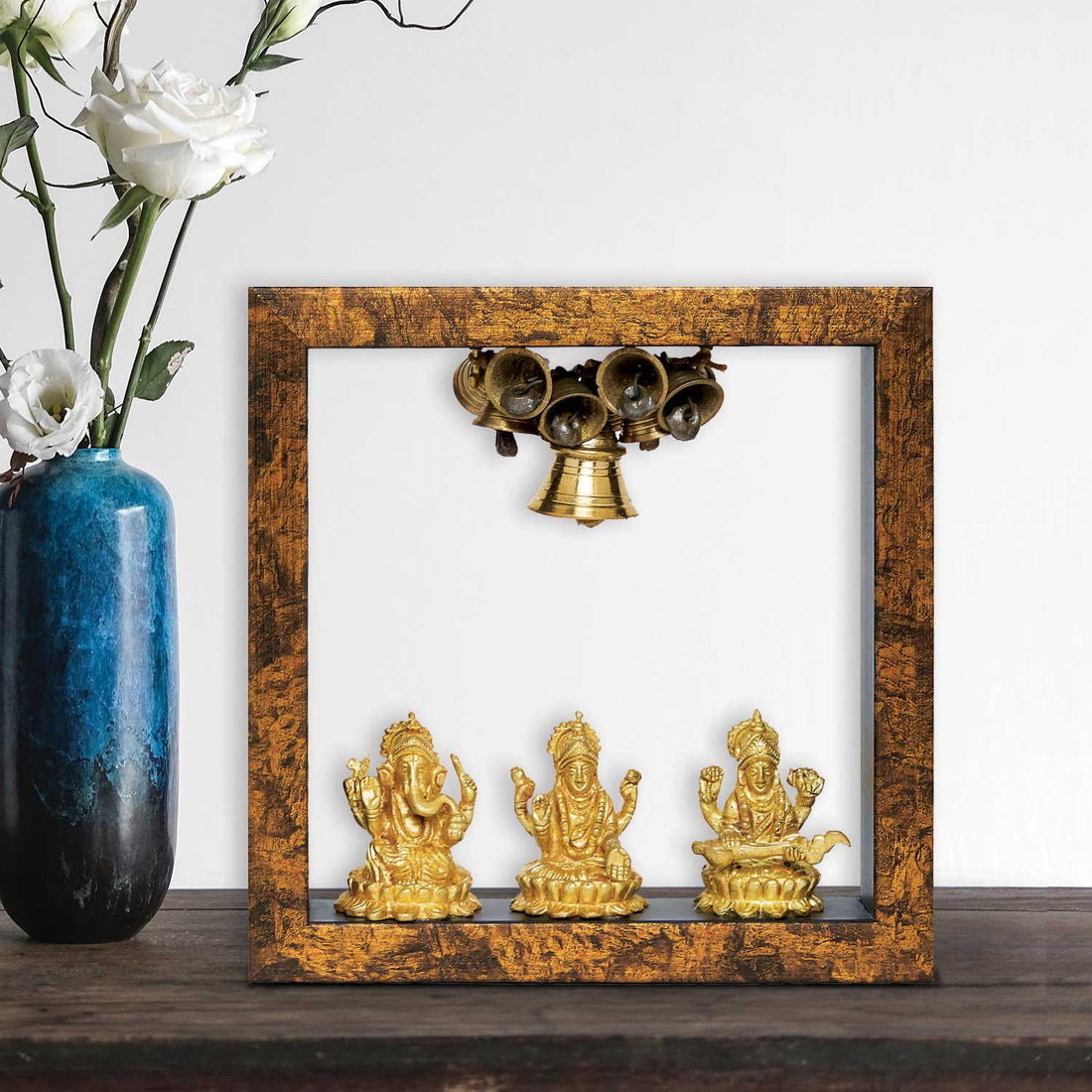 Wooden Temple Frame with Ganesha Laxmi and Saraswati