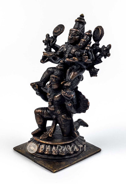 Garuda carrying Lord Vishnu and Lakshmi Devi